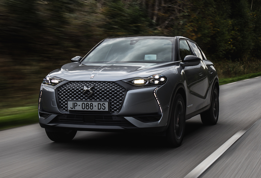 DS3 Crossback E tense exterior front driving in forest